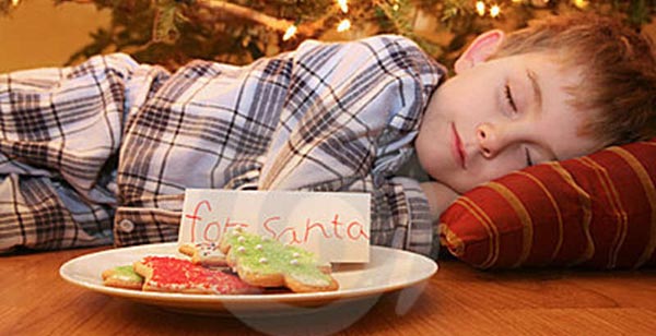 sleeping-boy-waiting-santa-17769120